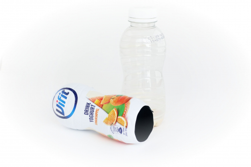 Seeking technology for recycling transparent PET bottles with full body light barrier sleeve
